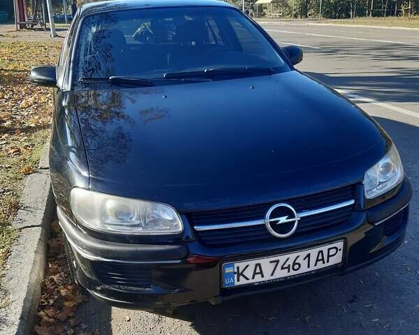 Черный Опель Омега, объемом двигателя 2 л и пробегом 200 тыс. км за 3300 $, фото 1 на Automoto.ua