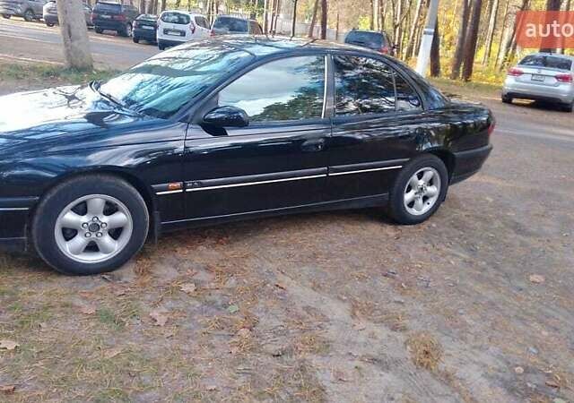 Чорний Опель Омега, об'ємом двигуна 2 л та пробігом 300 тис. км за 2600 $, фото 5 на Automoto.ua