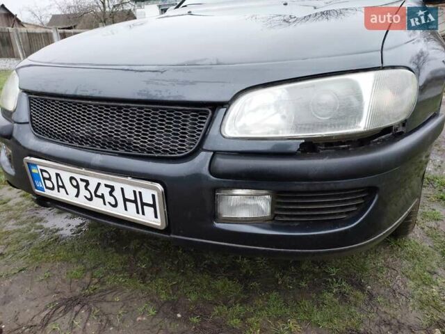 Чорний Опель Омега, об'ємом двигуна 2.5 л та пробігом 340 тис. км за 2596 $, фото 11 на Automoto.ua