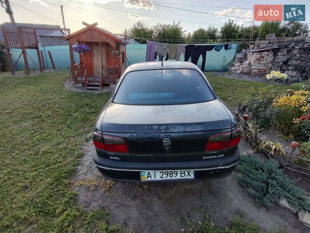 Черный Опель Омега, объемом двигателя 0 л и пробегом 190 тыс. км за 1000 $, фото 15 на Automoto.ua