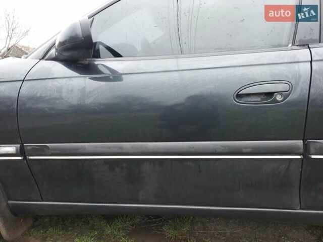 Чорний Опель Омега, об'ємом двигуна 2.5 л та пробігом 340 тис. км за 2596 $, фото 22 на Automoto.ua