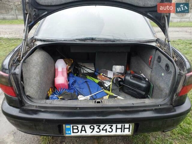 Чорний Опель Омега, об'ємом двигуна 2.5 л та пробігом 340 тис. км за 2596 $, фото 9 на Automoto.ua
