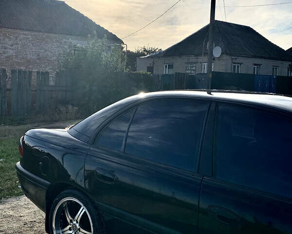 Чорний Опель Омега, об'ємом двигуна 2 л та пробігом 400 тис. км за 3000 $, фото 5 на Automoto.ua