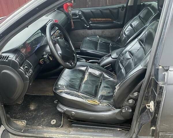 Чорний Опель Омега, об'ємом двигуна 2 л та пробігом 300 тис. км за 2100 $, фото 5 на Automoto.ua