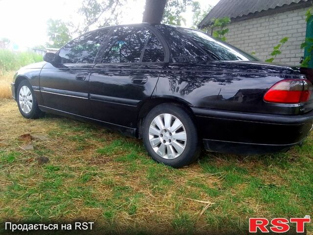 Чорний Опель Омега, об'ємом двигуна 2 л та пробігом 380 тис. км за 1700 $, фото 2 на Automoto.ua