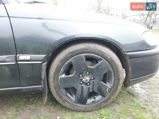 Чорний Опель Омега, об'ємом двигуна 2.5 л та пробігом 340 тис. км за 2596 $, фото 10 на Automoto.ua