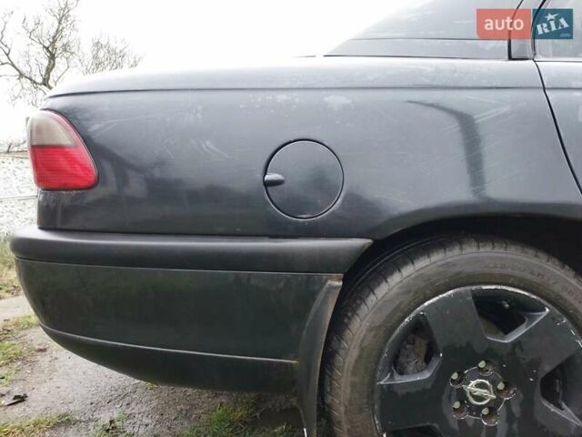 Чорний Опель Омега, об'ємом двигуна 2.5 л та пробігом 340 тис. км за 2596 $, фото 14 на Automoto.ua