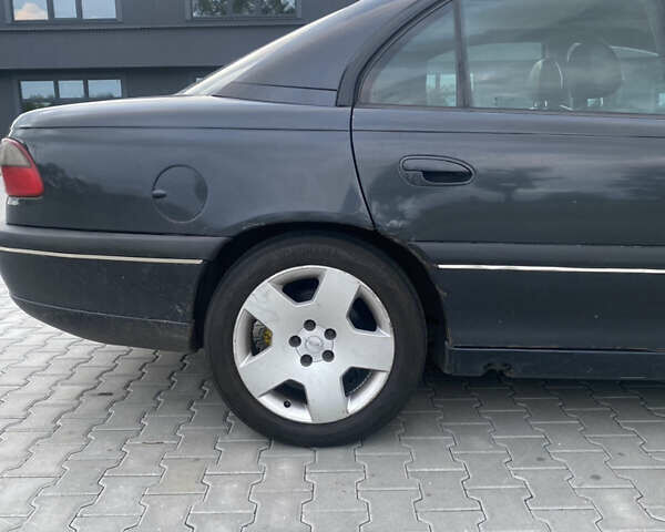 Чорний Опель Омега, об'ємом двигуна 2.5 л та пробігом 431 тис. км за 1750 $, фото 2 на Automoto.ua