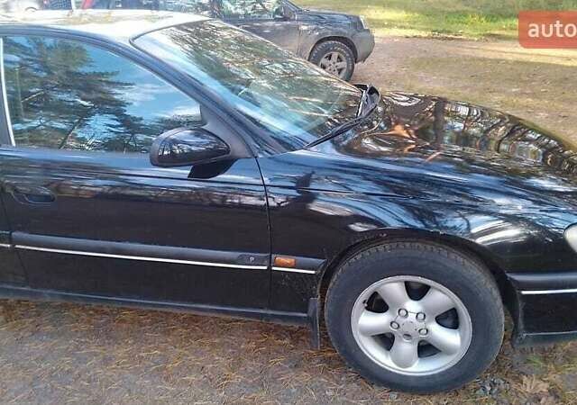 Чорний Опель Омега, об'ємом двигуна 2 л та пробігом 300 тис. км за 2600 $, фото 3 на Automoto.ua