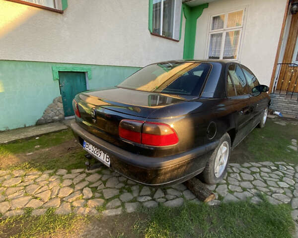 Черный Опель Омега, объемом двигателя 3 л и пробегом 300 тыс. км за 1000 $, фото 2 на Automoto.ua