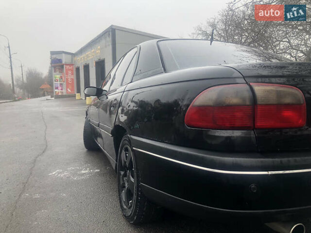 Черный Опель Омега, объемом двигателя 2 л и пробегом 298 тыс. км за 2399 $, фото 7 на Automoto.ua