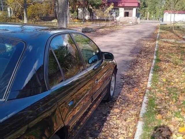 Чорний Опель Омега, об'ємом двигуна 2 л та пробігом 300 тис. км за 2600 $, фото 10 на Automoto.ua
