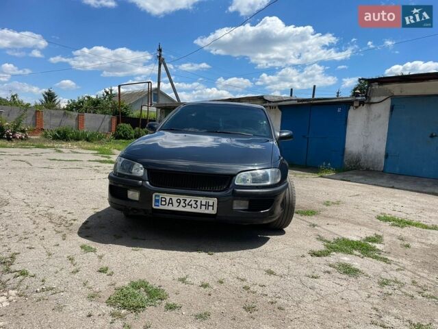 Черный Опель Омега, объемом двигателя 2.5 л и пробегом 370 тыс. км за 2500 $, фото 20 на Automoto.ua