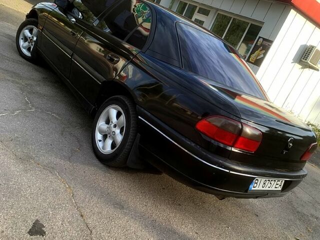 Черный Опель Омега, объемом двигателя 2 л и пробегом 313 тыс. км за 2550 $, фото 2 на Automoto.ua