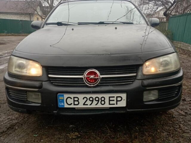 Черный Опель Омега, объемом двигателя 2 л и пробегом 250 тыс. км за 1450 $, фото 1 на Automoto.ua
