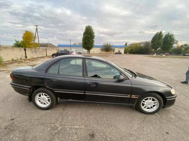 Черный Опель Омега, объемом двигателя 2 л и пробегом 144 тыс. км за 2500 $, фото 1 на Automoto.ua