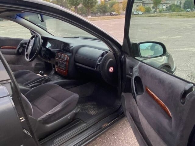 Черный Опель Омега, объемом двигателя 2 л и пробегом 144 тыс. км за 2500 $, фото 3 на Automoto.ua