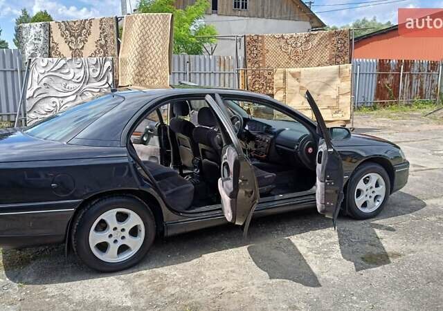 Черный Опель Омега, объемом двигателя 2 л и пробегом 281 тыс. км за 3449 $, фото 3 на Automoto.ua