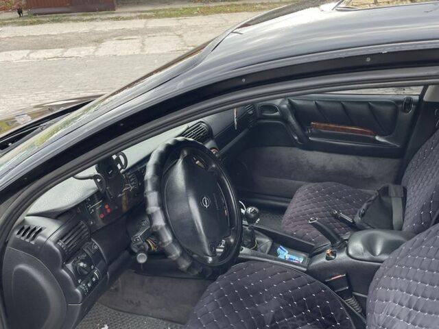 Чорний Опель Омега, об'ємом двигуна 2.9 л та пробігом 300 тис. км за 1500 $, фото 6 на Automoto.ua