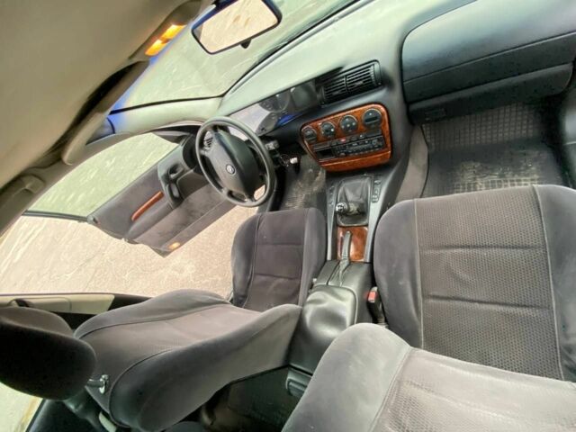 Черный Опель Омега, объемом двигателя 2 л и пробегом 144 тыс. км за 2500 $, фото 4 на Automoto.ua