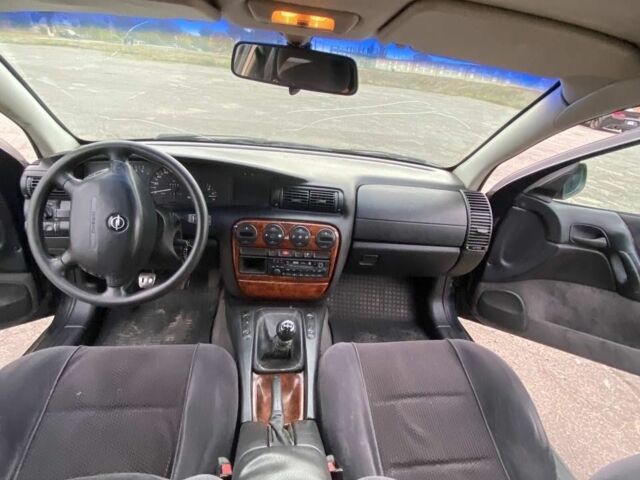 Черный Опель Омега, объемом двигателя 2 л и пробегом 144 тыс. км за 2500 $, фото 7 на Automoto.ua