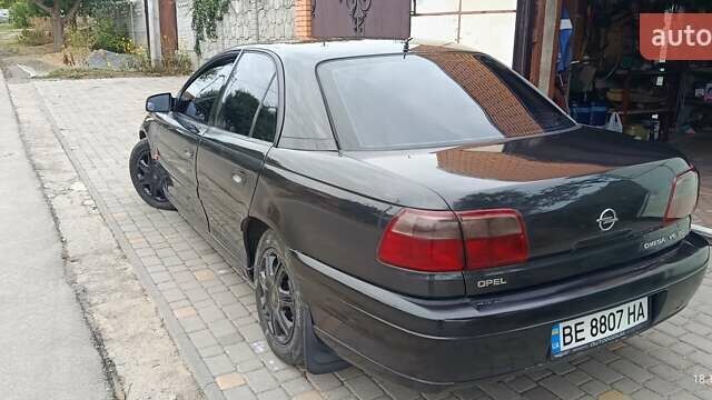 Чорний Опель Омега, об'ємом двигуна 3 л та пробігом 260 тис. км за 3500 $, фото 2 на Automoto.ua