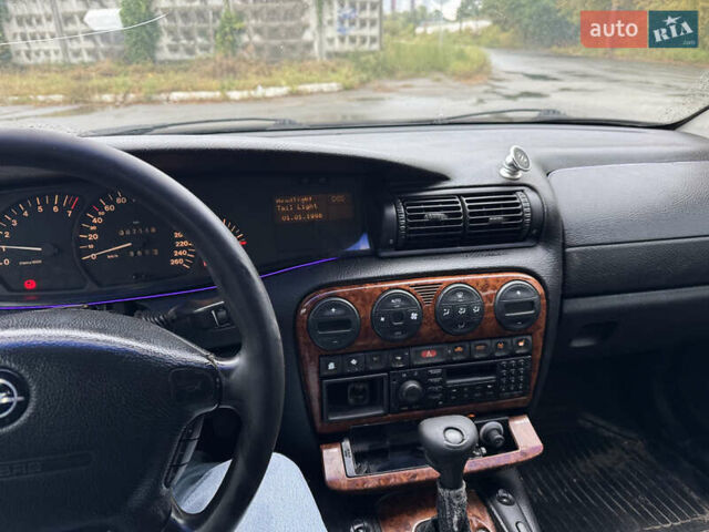 Черный Опель Омега, объемом двигателя 2.5 л и пробегом 400 тыс. км за 1499 $, фото 8 на Automoto.ua