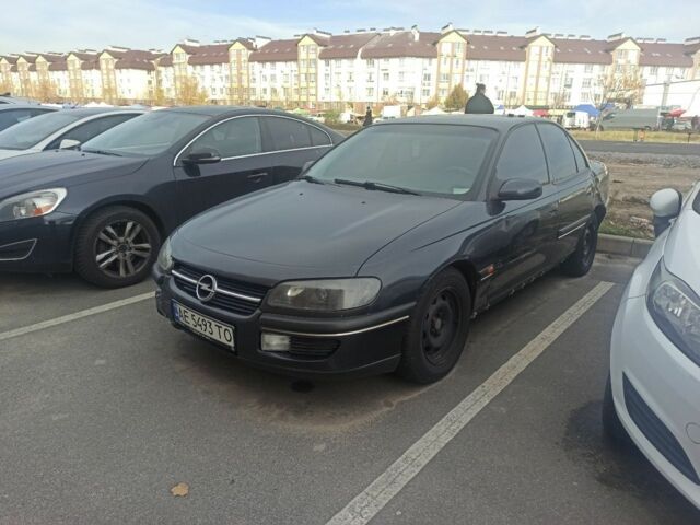 Чорний Опель Омега, об'ємом двигуна 2 л та пробігом 300 тис. км за 1450 $, фото 1 на Automoto.ua
