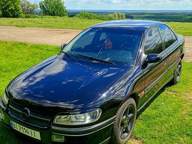 Чорний Опель Омега, об'ємом двигуна 2 л та пробігом 440 тис. км за 2500 $, фото 12 на Automoto.ua