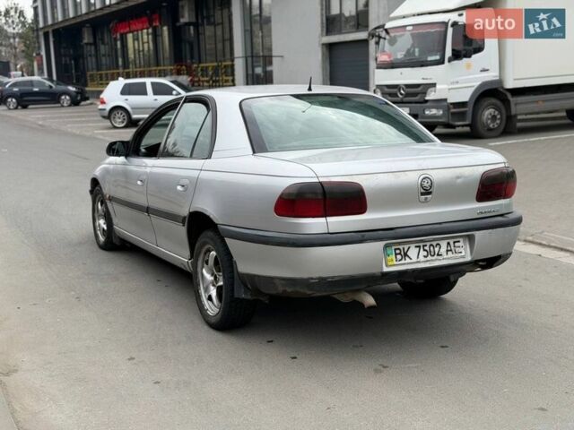 Черный Опель Омега, объемом двигателя 2.5 л и пробегом 407 тыс. км за 1650 $, фото 2 на Automoto.ua