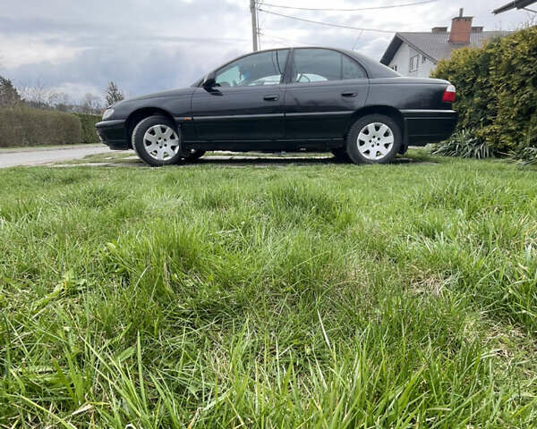 Чорний Опель Омега, об'ємом двигуна 2.2 л та пробігом 250 тис. км за 3900 $, фото 19 на Automoto.ua