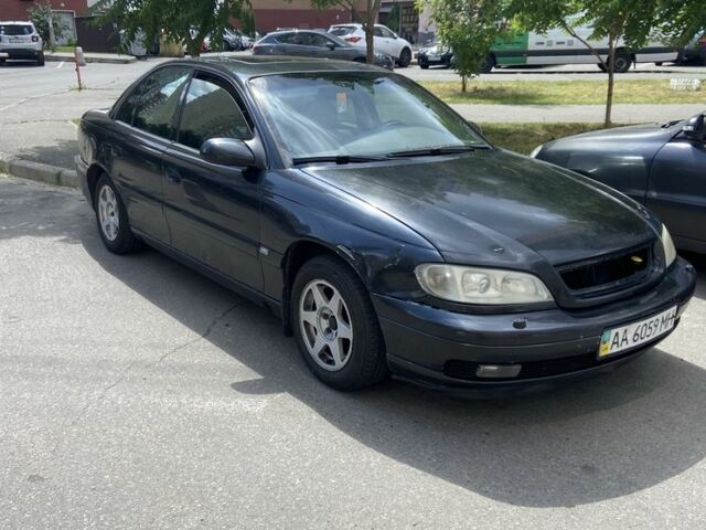 Чорний Опель Омега, об'ємом двигуна 2.5 л та пробігом 240 тис. км за 2800 $, фото 4 на Automoto.ua