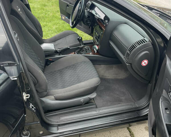 Чорний Опель Омега, об'ємом двигуна 2.2 л та пробігом 250 тис. км за 3900 $, фото 4 на Automoto.ua