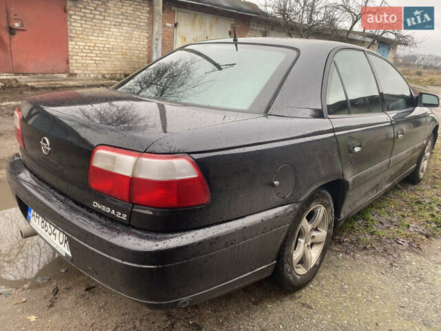 Черный Опель Омега, объемом двигателя 2.2 л и пробегом 313 тыс. км за 3200 $, фото 2 на Automoto.ua