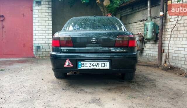 Черный Опель Омега, объемом двигателя 2.5 л и пробегом 400 тыс. км за 3000 $, фото 1 на Automoto.ua