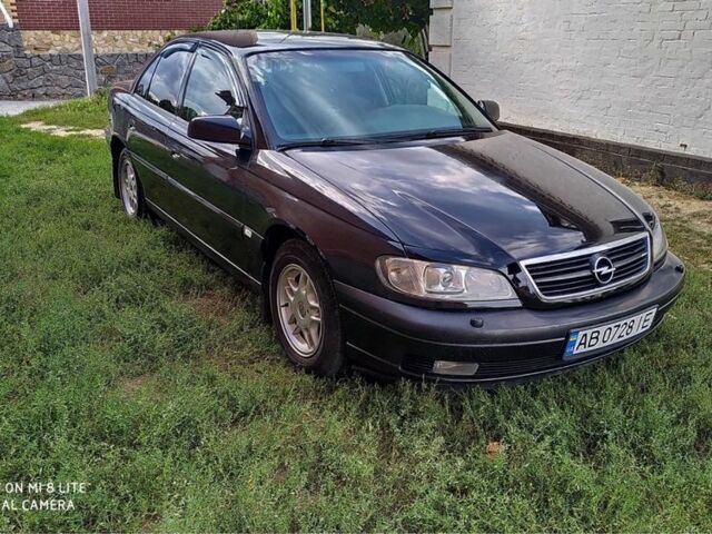 Черный Опель Омега, объемом двигателя 2.2 л и пробегом 274 тыс. км за 3000 $, фото 12 на Automoto.ua