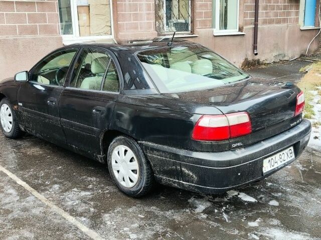 Чорний Опель Омега, об'ємом двигуна 2.5 л та пробігом 330 тис. км за 1800 $, фото 1 на Automoto.ua