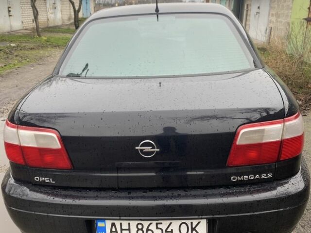 Чорний Опель Омега, об'ємом двигуна 2.2 л та пробігом 313 тис. км за 3600 $, фото 4 на Automoto.ua