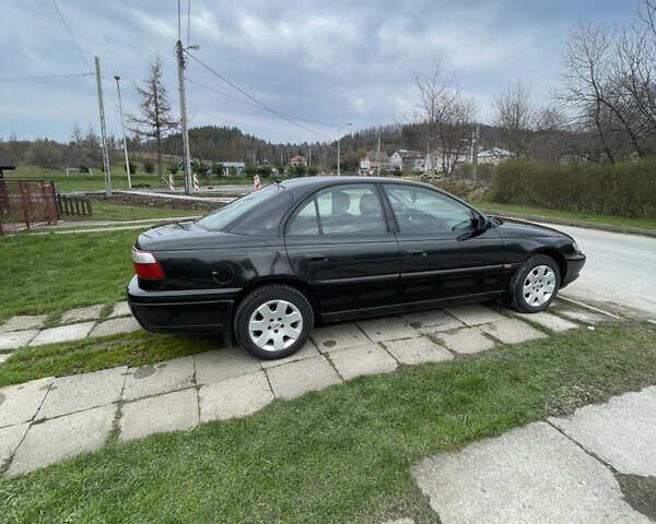 Чорний Опель Омега, об'ємом двигуна 2.2 л та пробігом 250 тис. км за 3900 $, фото 14 на Automoto.ua