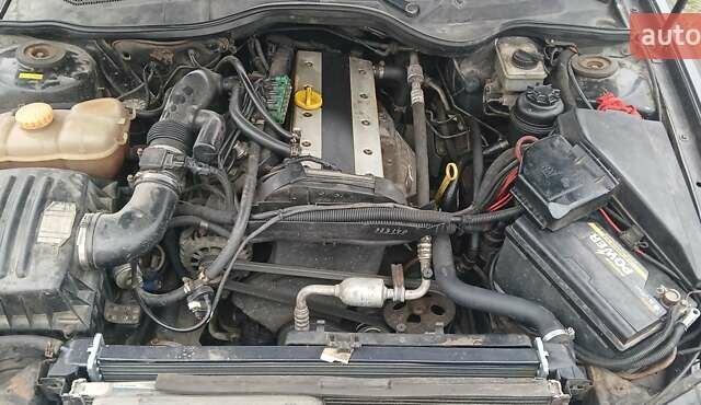 Чорний Опель Омега, об'ємом двигуна 2.2 л та пробігом 350 тис. км за 2050 $, фото 1 на Automoto.ua