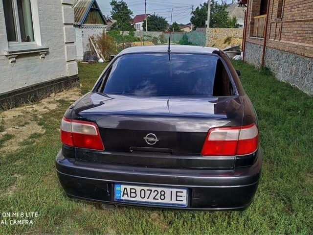 Черный Опель Омега, объемом двигателя 2.2 л и пробегом 274 тыс. км за 3000 $, фото 10 на Automoto.ua