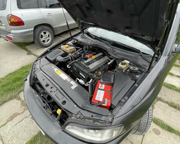 Чорний Опель Омега, об'ємом двигуна 2.2 л та пробігом 250 тис. км за 3900 $, фото 6 на Automoto.ua