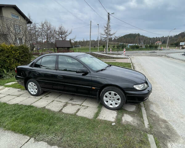 Чорний Опель Омега, об'ємом двигуна 2.2 л та пробігом 250 тис. км за 3900 $, фото 13 на Automoto.ua