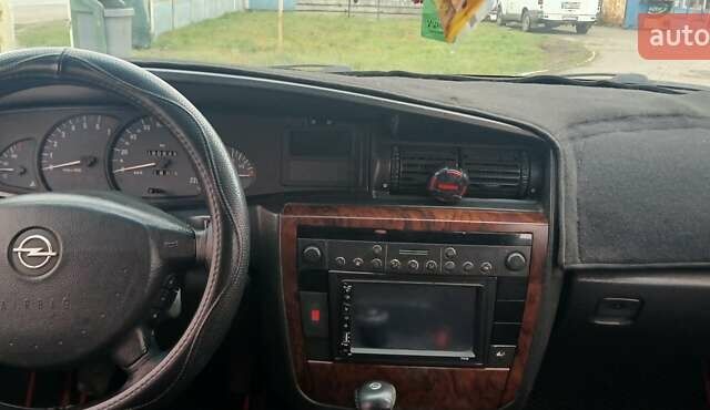 Чорний Опель Омега, об'ємом двигуна 2.2 л та пробігом 350 тис. км за 2050 $, фото 7 на Automoto.ua