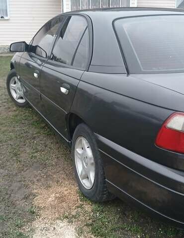 Чорний Опель Омега, об'ємом двигуна 2.2 л та пробігом 350 тис. км за 2050 $, фото 3 на Automoto.ua