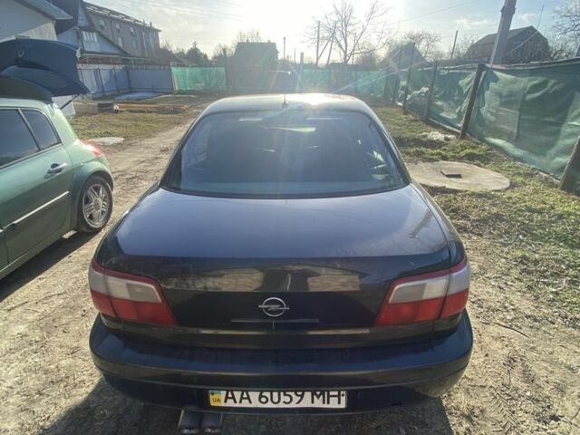 Чорний Опель Омега, об'ємом двигуна 2.5 л та пробігом 242 тис. км за 2650 $, фото 7 на Automoto.ua