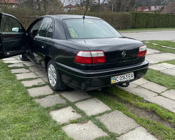 Чорний Опель Омега, об'ємом двигуна 2.2 л та пробігом 250 тис. км за 3900 $, фото 8 на Automoto.ua