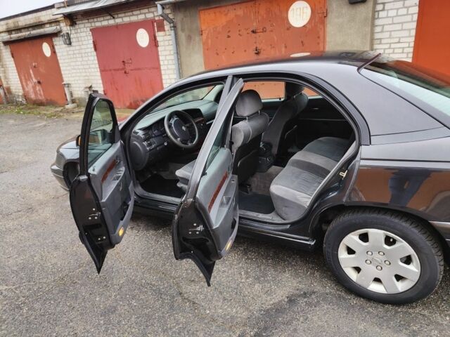 Черный Опель Омега, объемом двигателя 2.2 л и пробегом 249 тыс. км за 3350 $, фото 2 на Automoto.ua