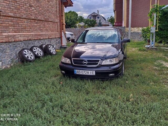 Черный Опель Омега, объемом двигателя 2.2 л и пробегом 274 тыс. км за 3000 $, фото 15 на Automoto.ua