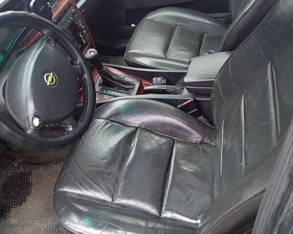 Черный Опель Омега, объемом двигателя 3 л и пробегом 361 тыс. км за 2500 $, фото 4 на Automoto.ua